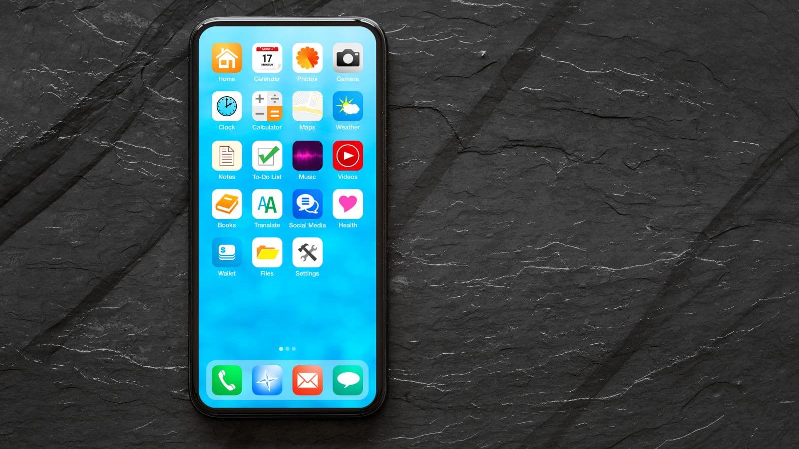 Smartphone affichant une grille d'applications sur une surface sombre
